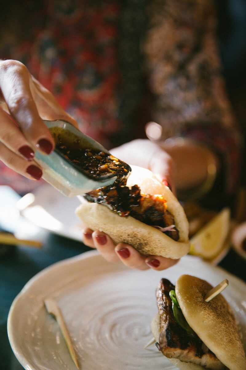 Pork buns with sticky peanut sauce