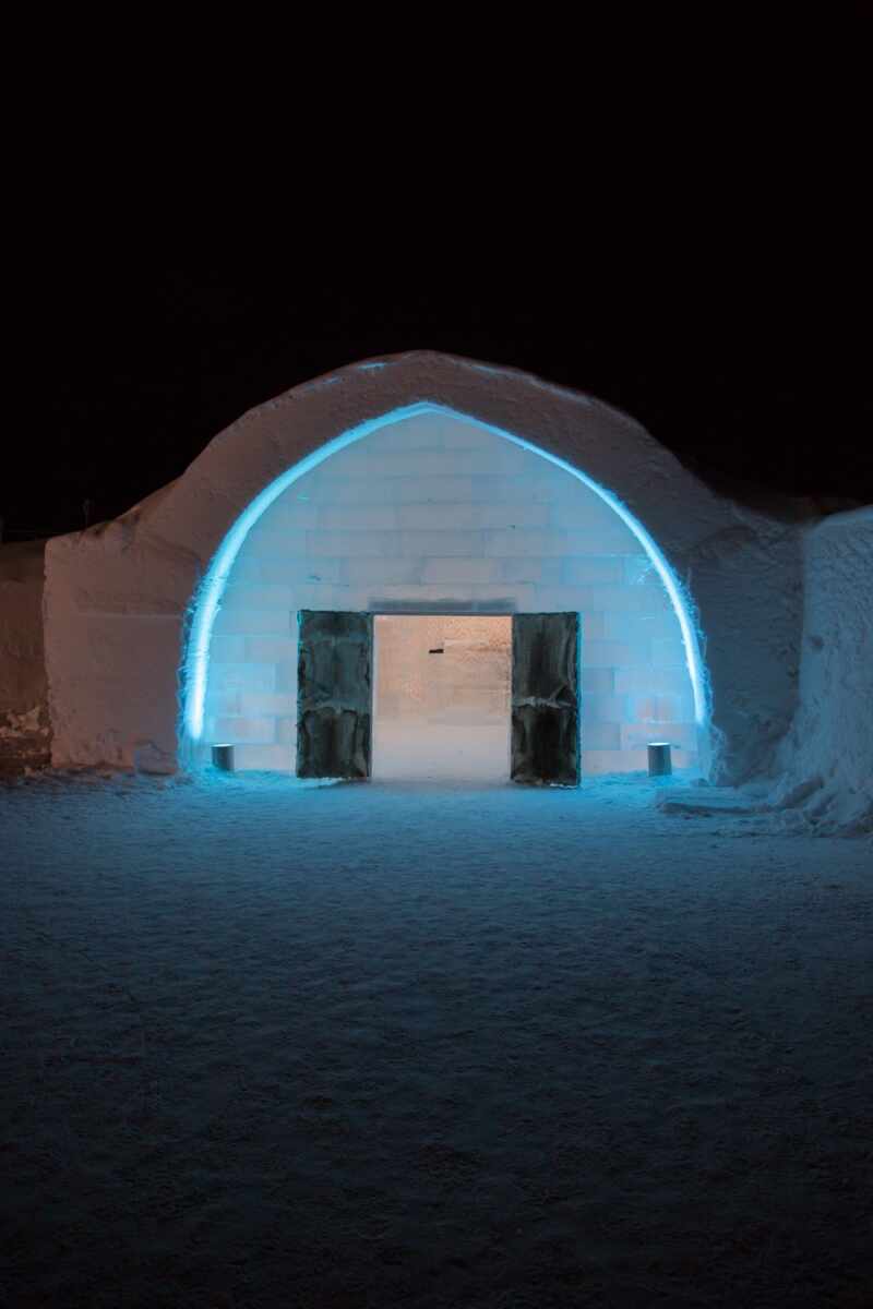 Glowing entrance to The Ice Hotel