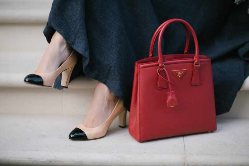 Chanel pumps and Prada tote 