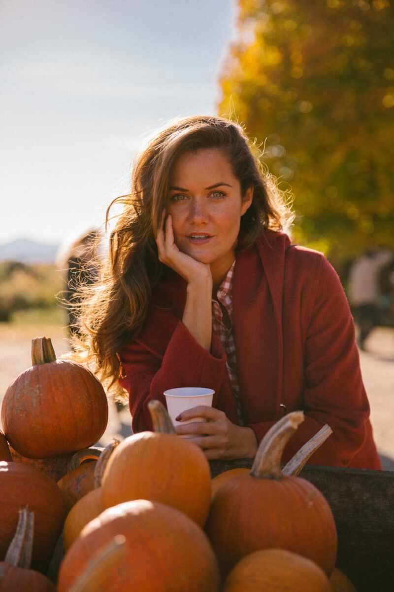Pumpkin Picking in a Red Coat